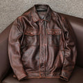 Men's black lapel leather jacket with side seam pockets in loose fit design