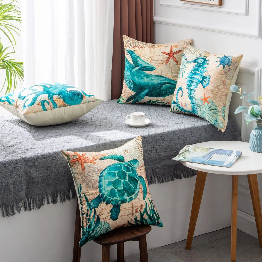 Square linen cushion cover with a detailed blue sea turtle print, showing a hidden zipper along one edge.