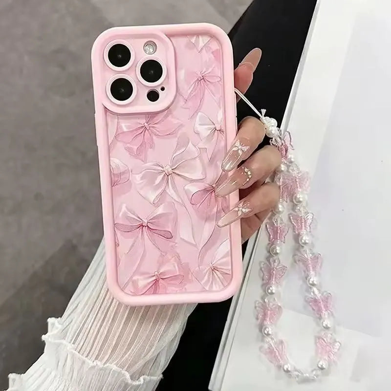 Pink matte silicone phone case with bow for iPhone 16