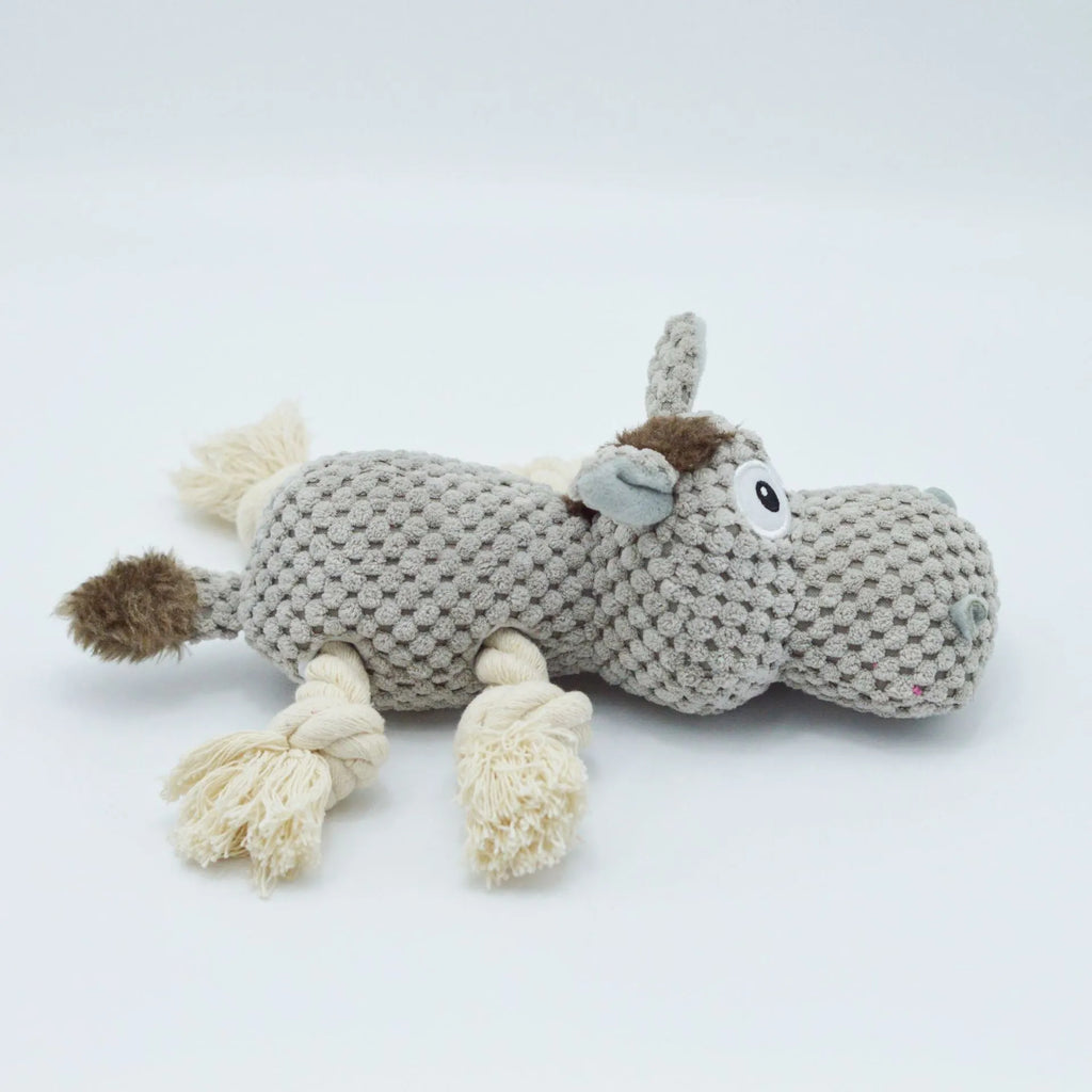 Grey donkey plush dog toy with creaking sound mechanism