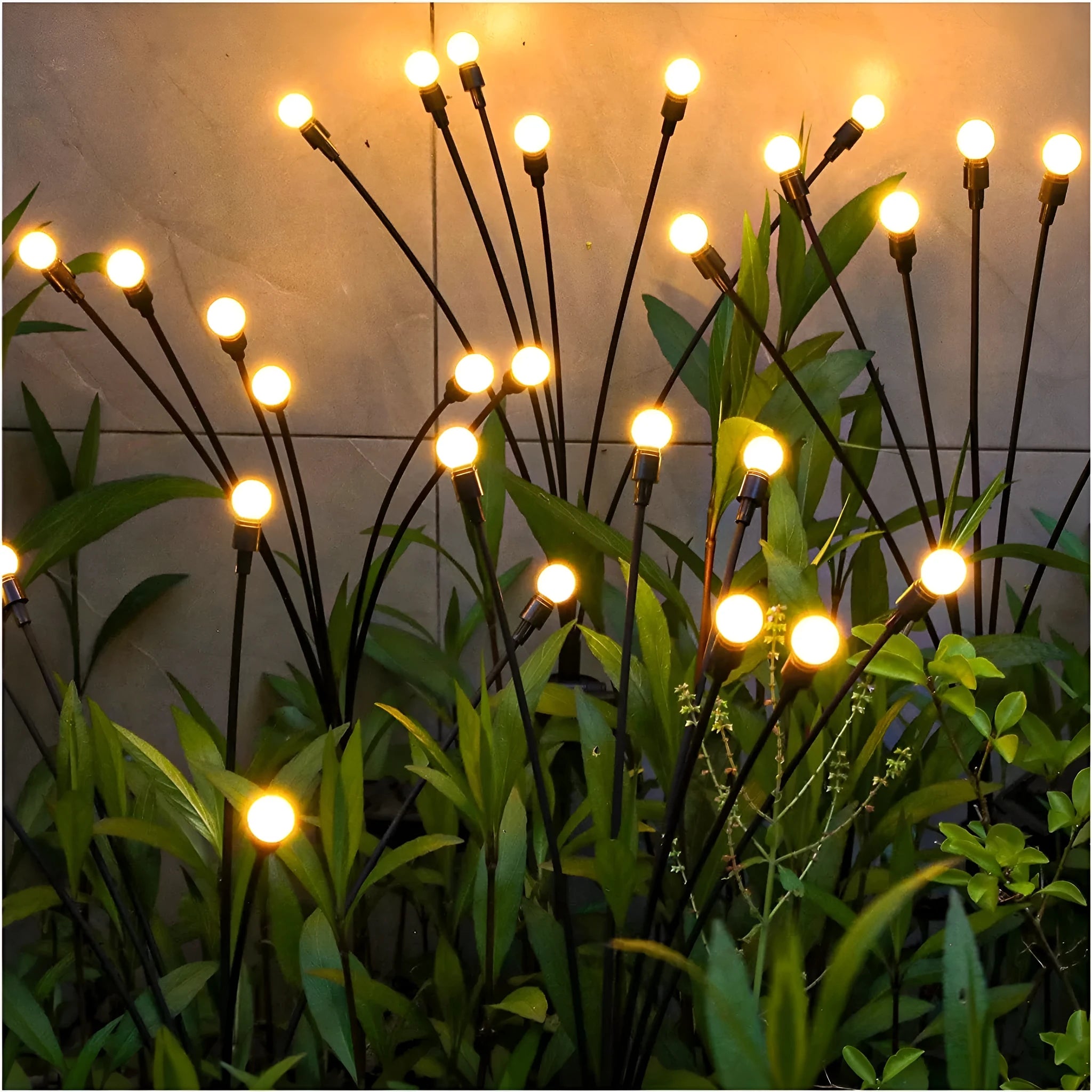 Solar-powered LED garden light with multiple heads on stainless steel ground spikes
