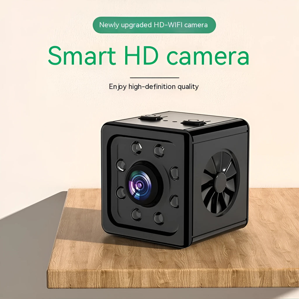 Black cubic K13 HD network sports camera with mounting bracket and data cable.