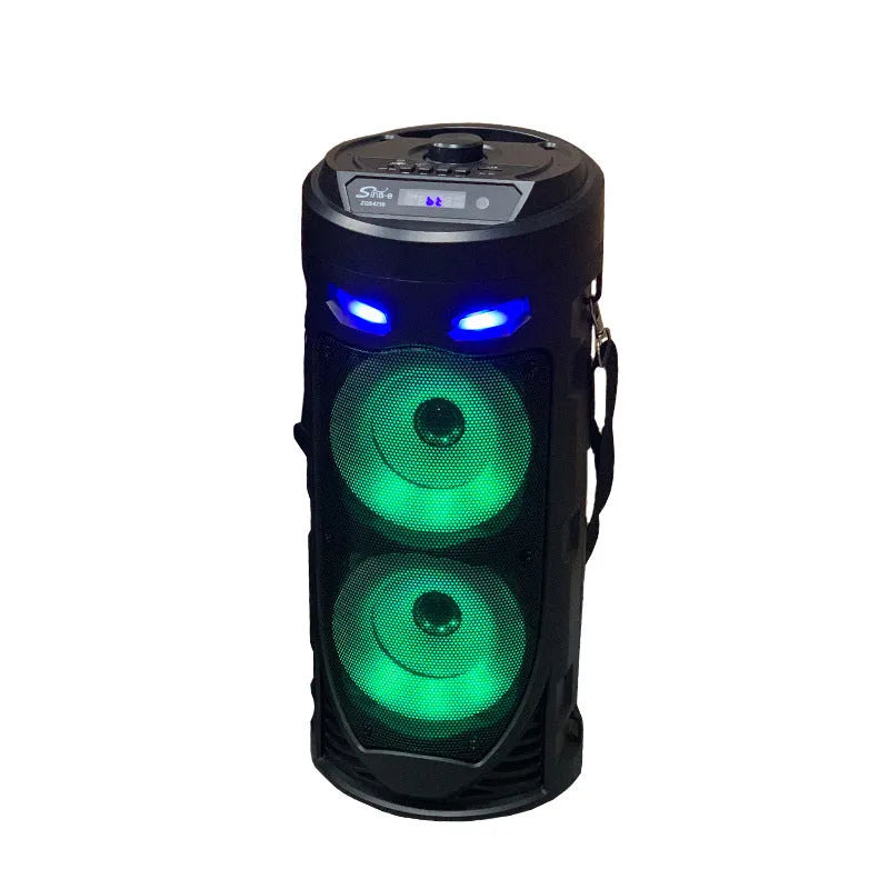 Black portable Bluetooth speaker with dual horn design and wheat detailing, showing USB port and card slot