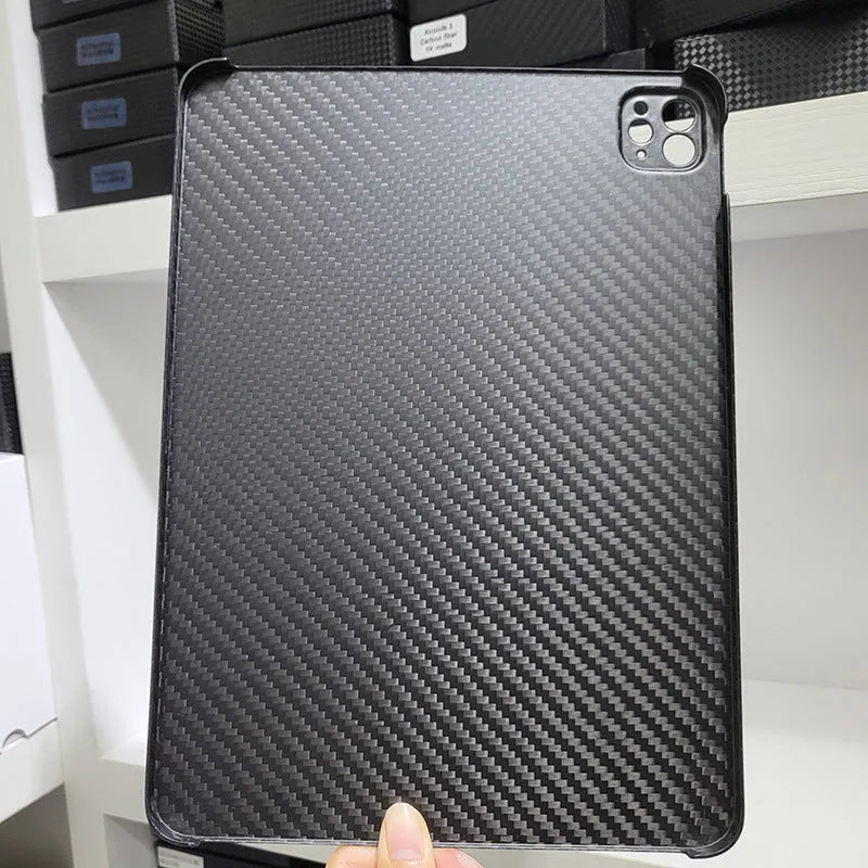 Carbon fibre hard protective case for iPad Pro 11 showing forged surface texture
