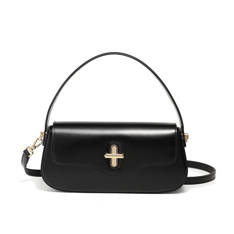 Genuine leather baguette handbag in caramel colour with clamshell design and shoulder straps