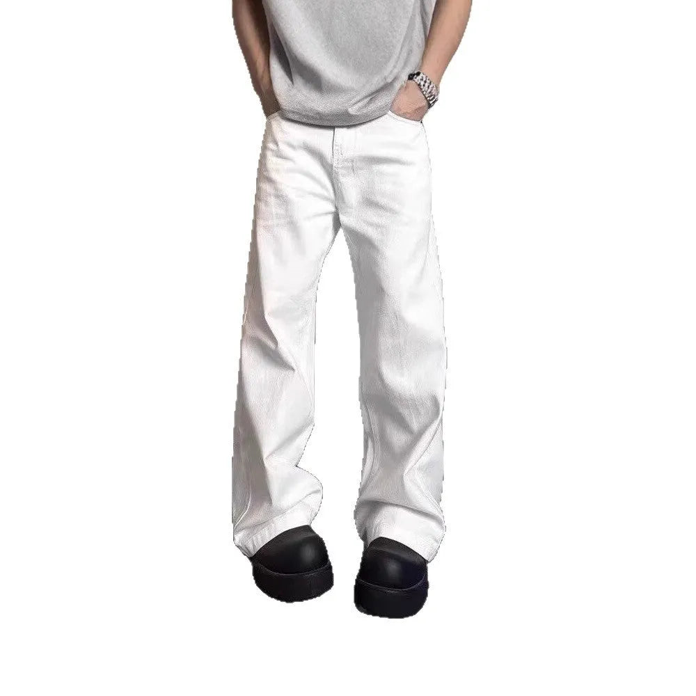 Men's white straight wide-leg denim jeans on a mid waist, showing zipper fly and relaxed fit.