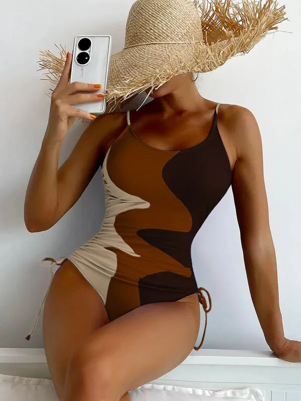 Blue women's sleeveless one-piece swimsuit with fixed swimming trunks on a mannequin