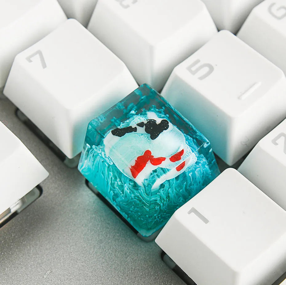 Handcrafted resin keycap with koi fish and pond scenery for Cherry MX keyboard switches.