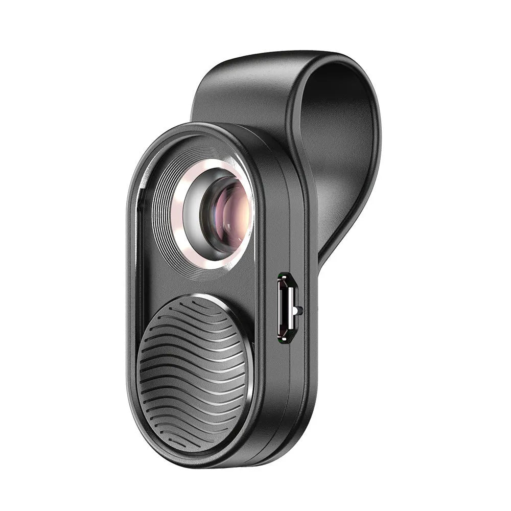 Black mobile magnification microscope with LED light clamped onto a smartphone, showing 100x magnification lens detail