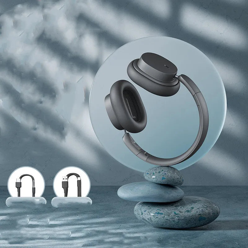 Beige and grey Bluetooth over-ear headphones with head-mounted design showing earcups and adjustable headband