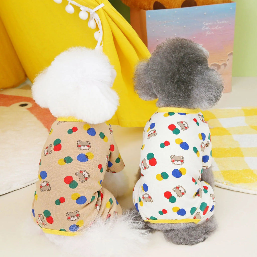 Beige dog t-shirt with a colourful cartoon bear print, showing a casual fit on a pet.