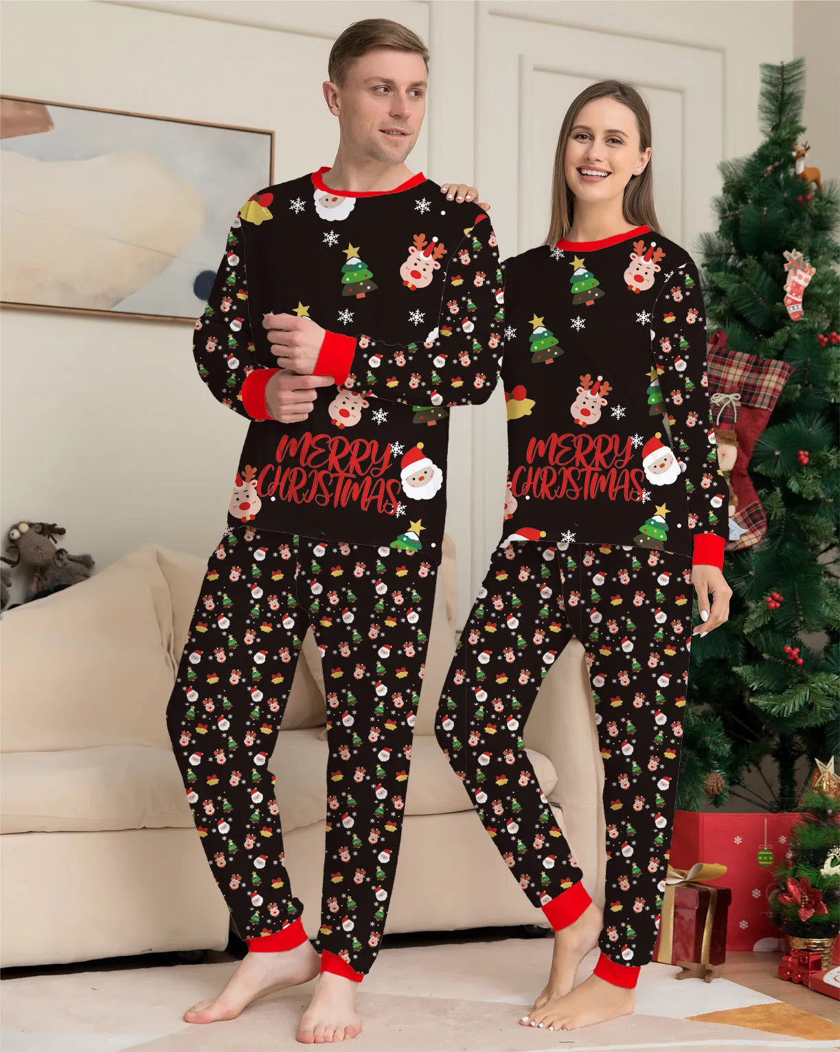 Family wearing matching red plaid Christmas pyjamas with a dog in a matching set.