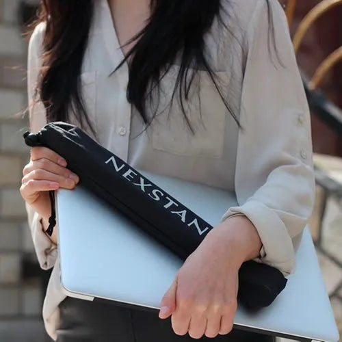 Black foldable laptop stand with height adjustment and protective nylon carrying case