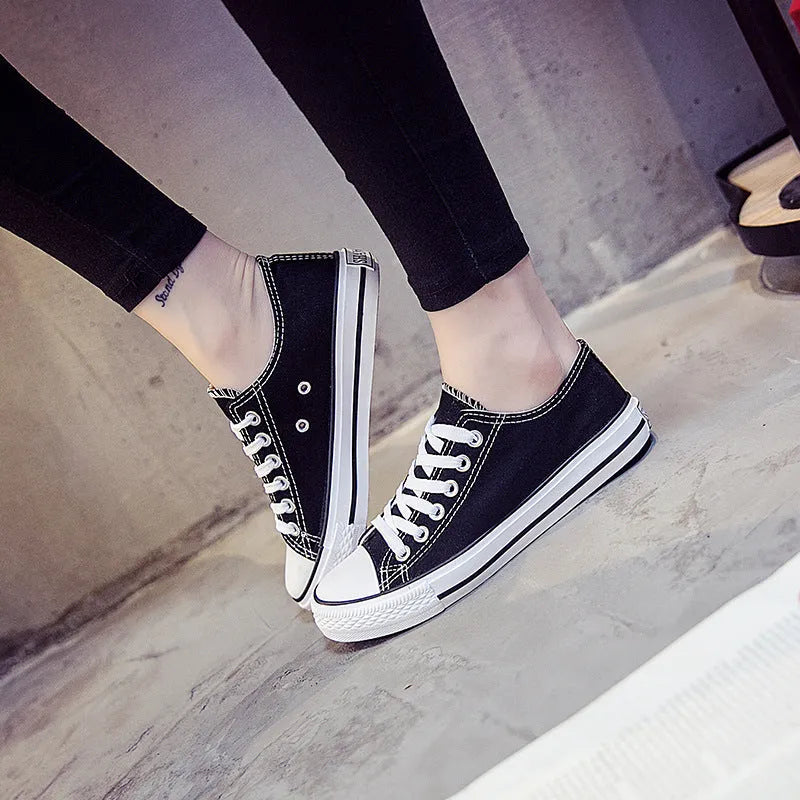 Women's solid colour canvas casual shoes in black, white black, white red, and all black colourways