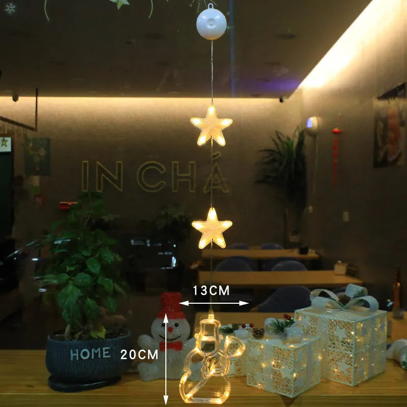 Christmas window lights with star-shaped LED pendants and suction cups for battery-operated festive decoration