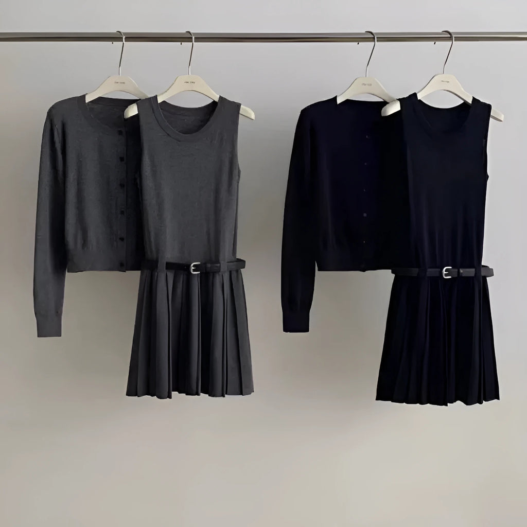 Women's black art retro knitted two-piece set with long-sleeve cardigan, pleated vest skirt, and a belt.