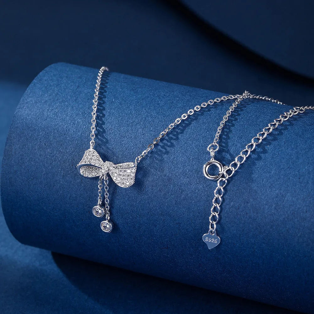 S925 sterling silver bow pendant necklace with adjustable chain for women