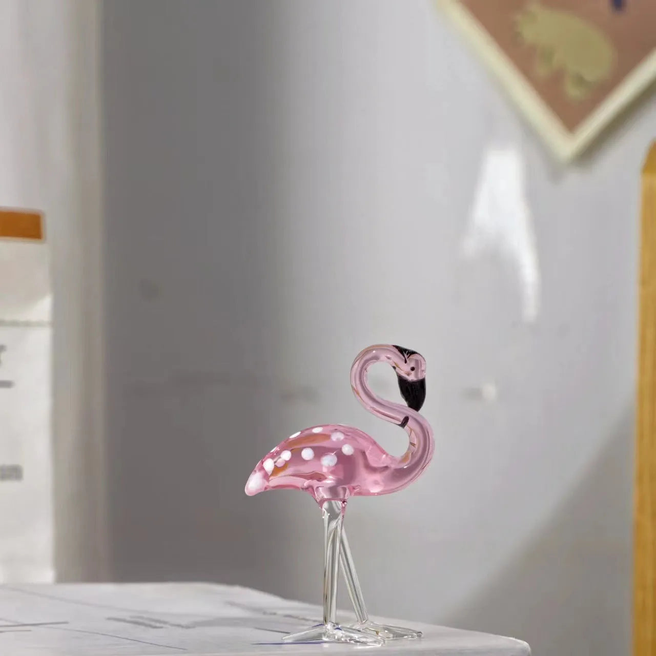 Pink and white crystal flamingo decorative ornament for tabletop display.