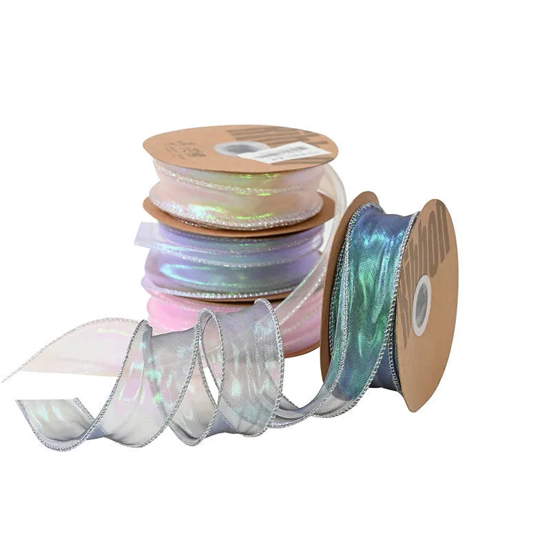 Roll of colourful fishtail yarn wave ribbon in mesh material, showing its textured, wave-like design.