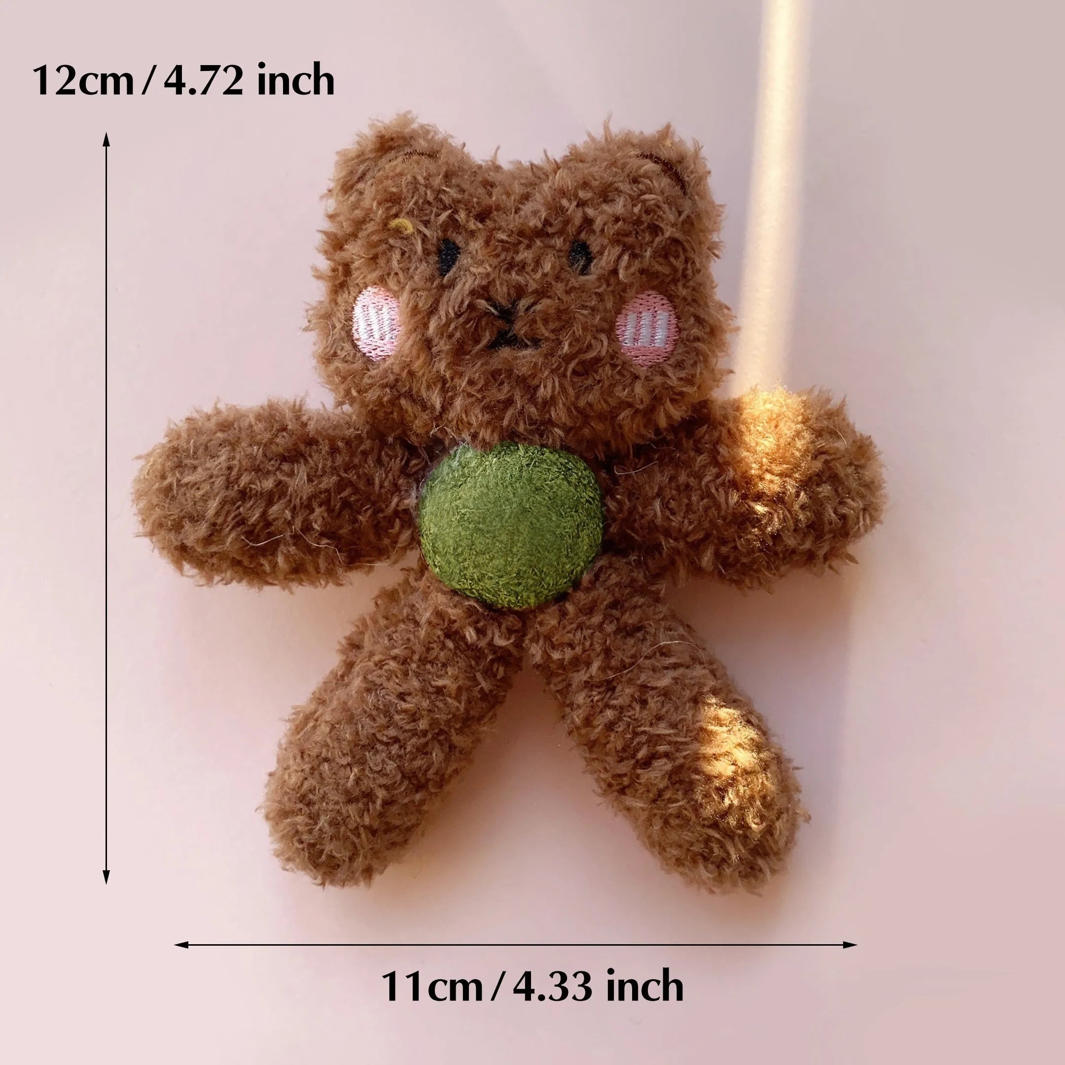Catnip chewing ball toy for dental care in animal designs measuring 12.5cm by 11cm