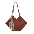 Women's large capacity black PU leather shoulder bag showing front view with external pocket