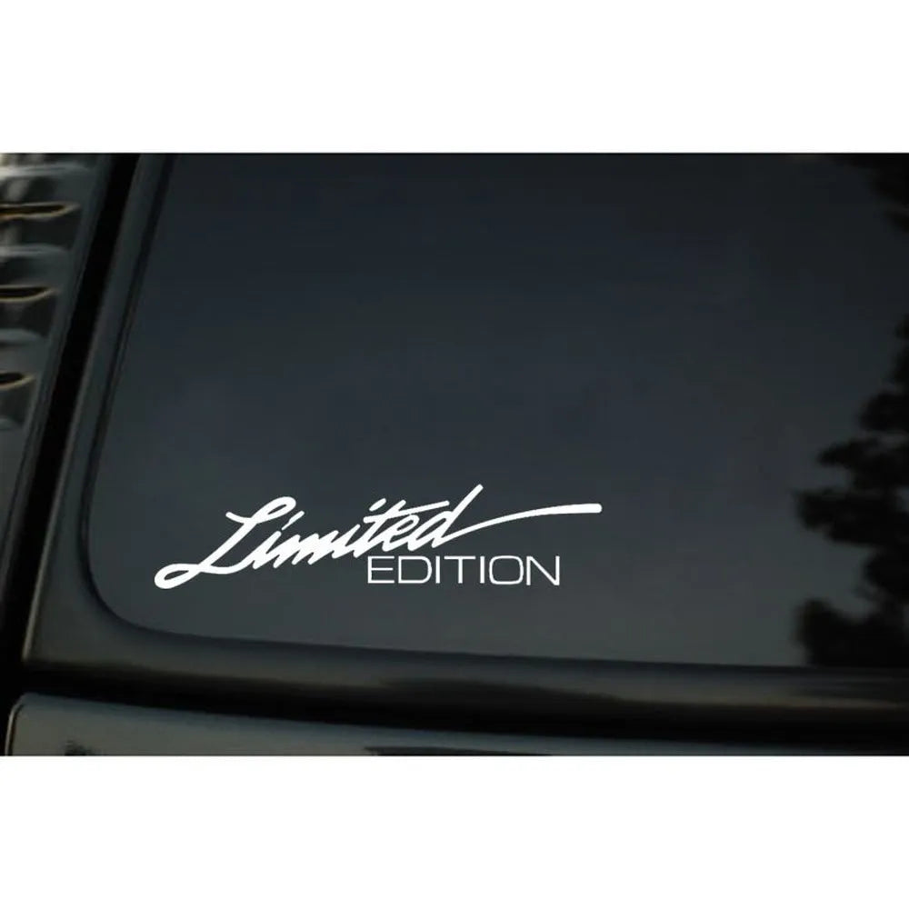 Reflective plastic bumper sticker in black, white, and colourful options showing 16cm by 3.8cm size.