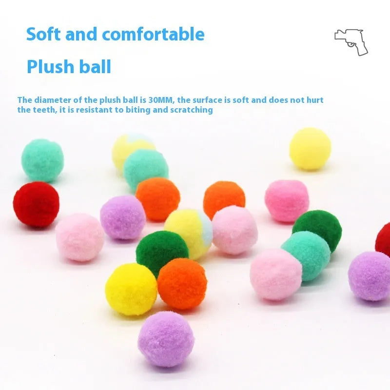 A 30cm long plush ball launcher gun for pets with a selection of soft 3cm yarn balls.