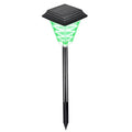 Solar garden light with colour changing LEDs in outdoor setting showing flame, green, red, and white light options