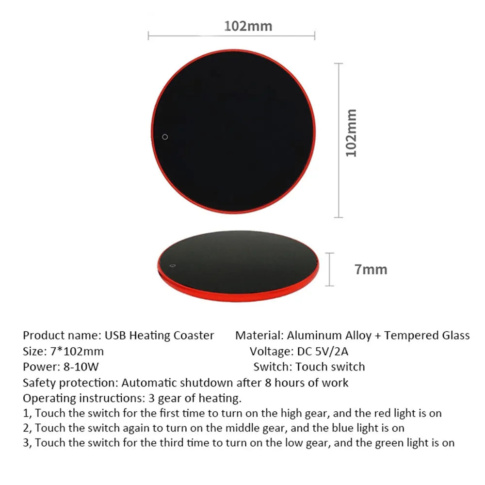 Black USB-powered beverage warming coaster with tempered glass top on a wooden desk