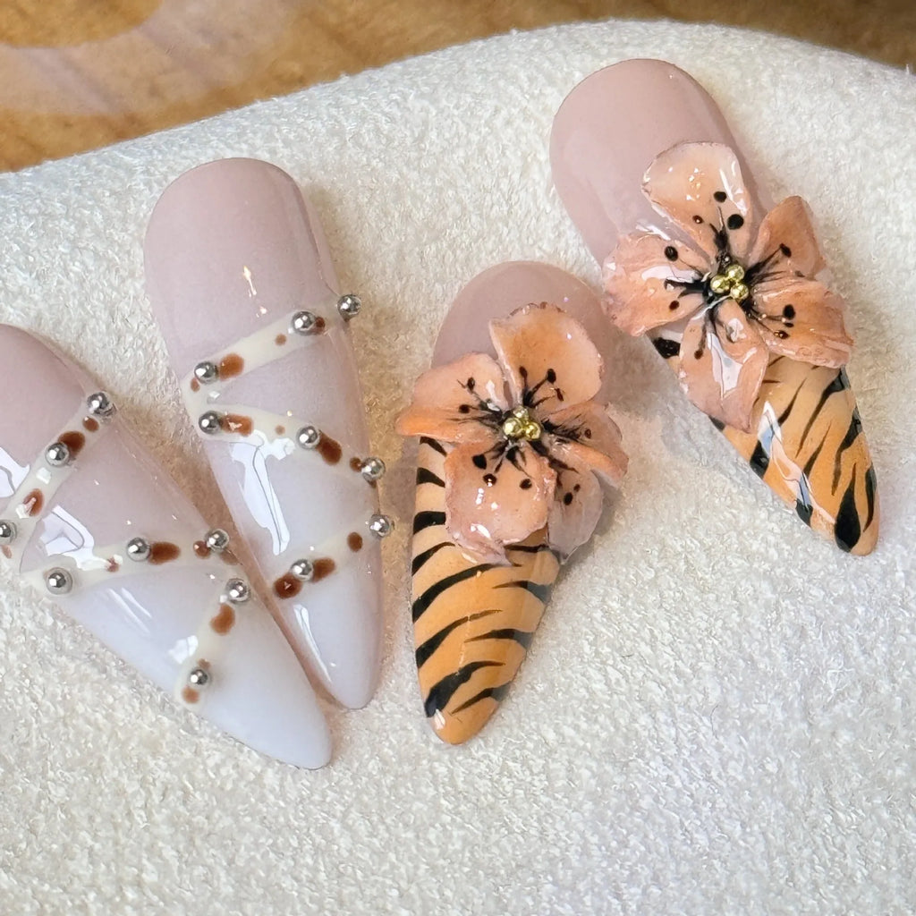 Handmade French style leopard print nail armour stickers with cross and flower patterns.