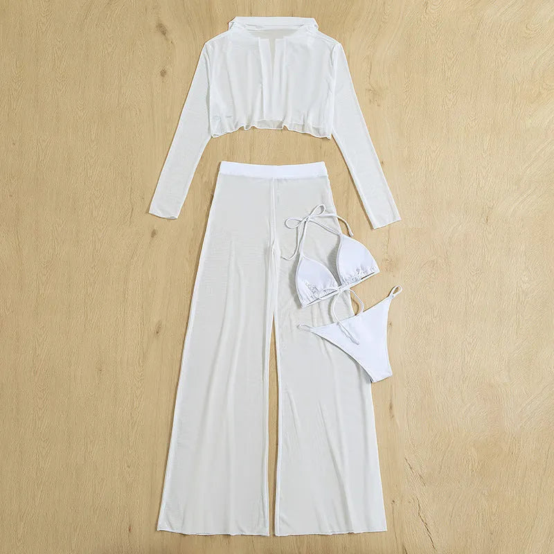 Women's white swimsuit four-piece set showing high-waist trousers and backless top