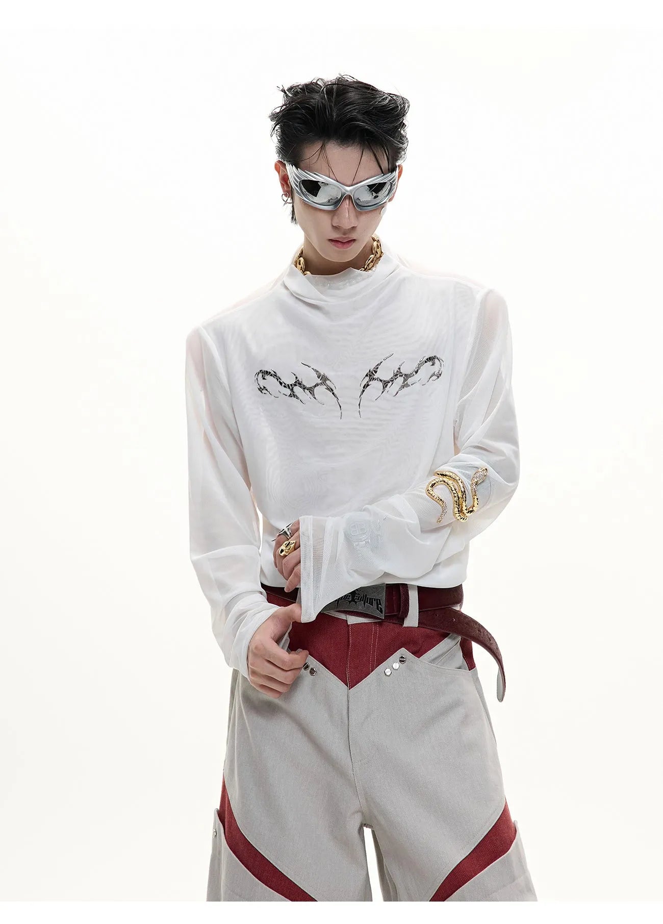 Black and white long sleeve mesh slim fit shirt laid flat, showing mesh fabric texture.
