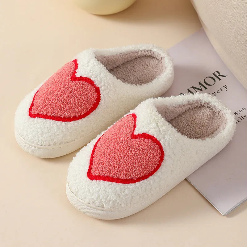 Women's plush cartoon love design slippers with non-slip PVC soles in multiple colour options