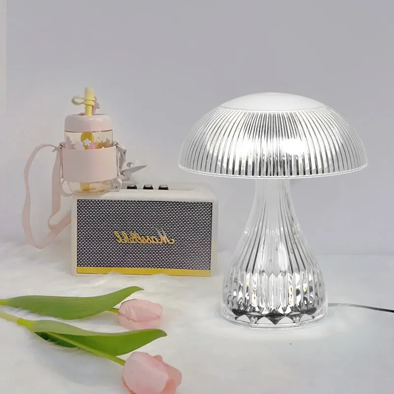 White USB rechargeable acrylic table lamp with three-colour changing LED light, dimensions 20cm by 16cm.