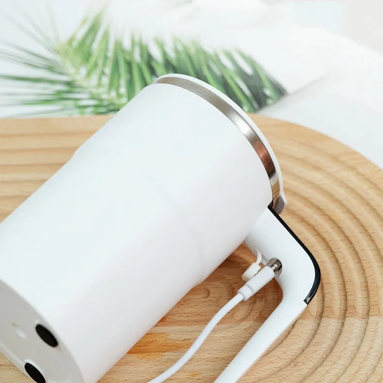 White automatic electric stirring cup with LCD screen and USB charging cable.
