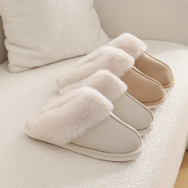 Women's plush winter slippers with artificial wool lining and a PVC sole in multiple colours.