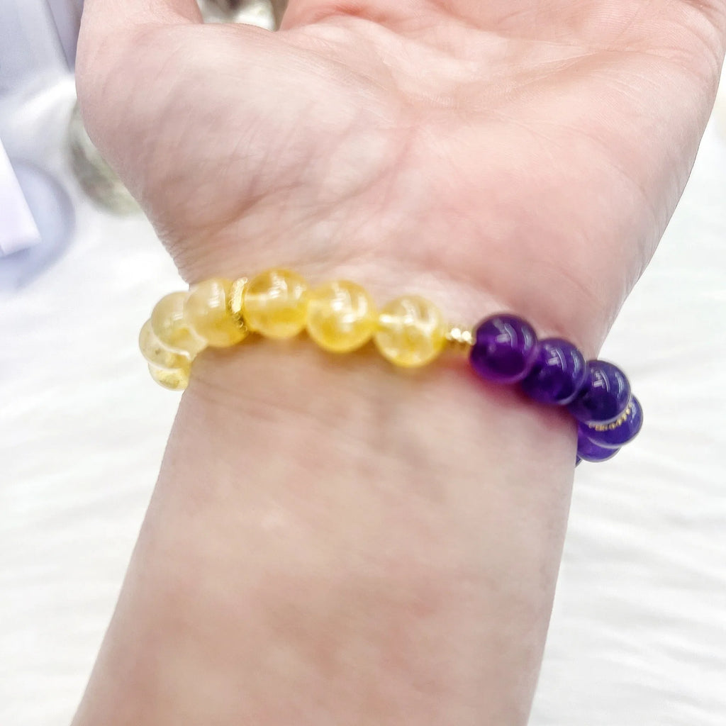 Handmade women's yellow and purple crystal bracelet with amethyst beads
