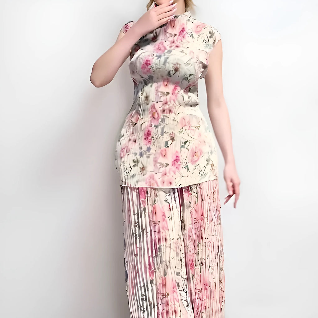 Women's printed chiffon dress set with high waist skirt and long sleeve top.