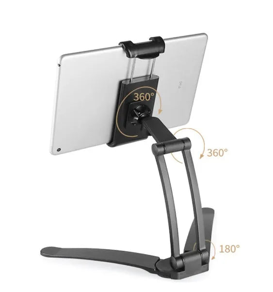Silver aluminium alloy desktop tablet stand with adjustable clips and 360-degree rotation on a white mount.