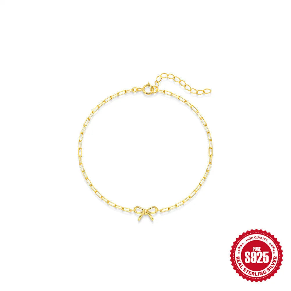 S925 sterling silver bracelet with clip chain and geometric heart charm in gold colour