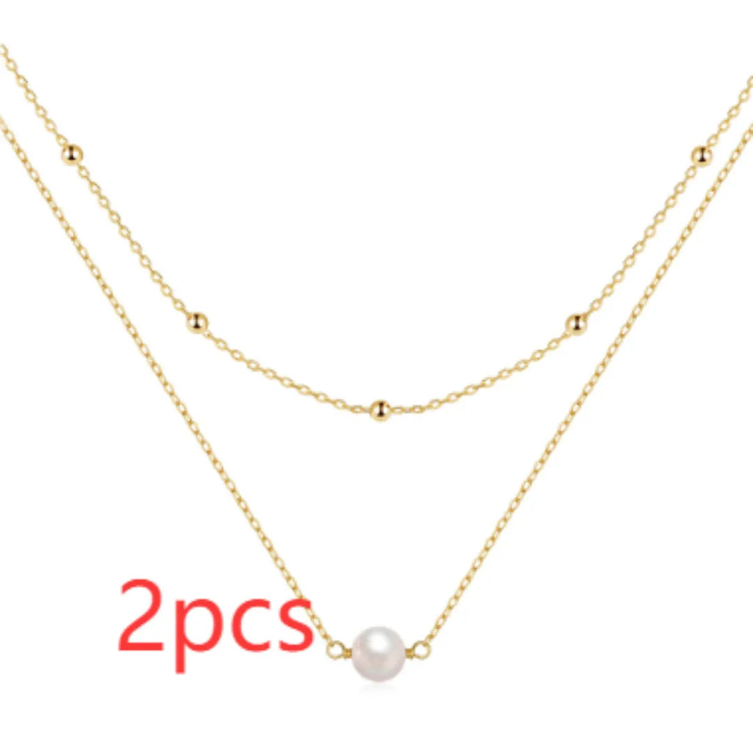 S925 sterling silver double layer twin pearl necklace with geometric design in gold colour