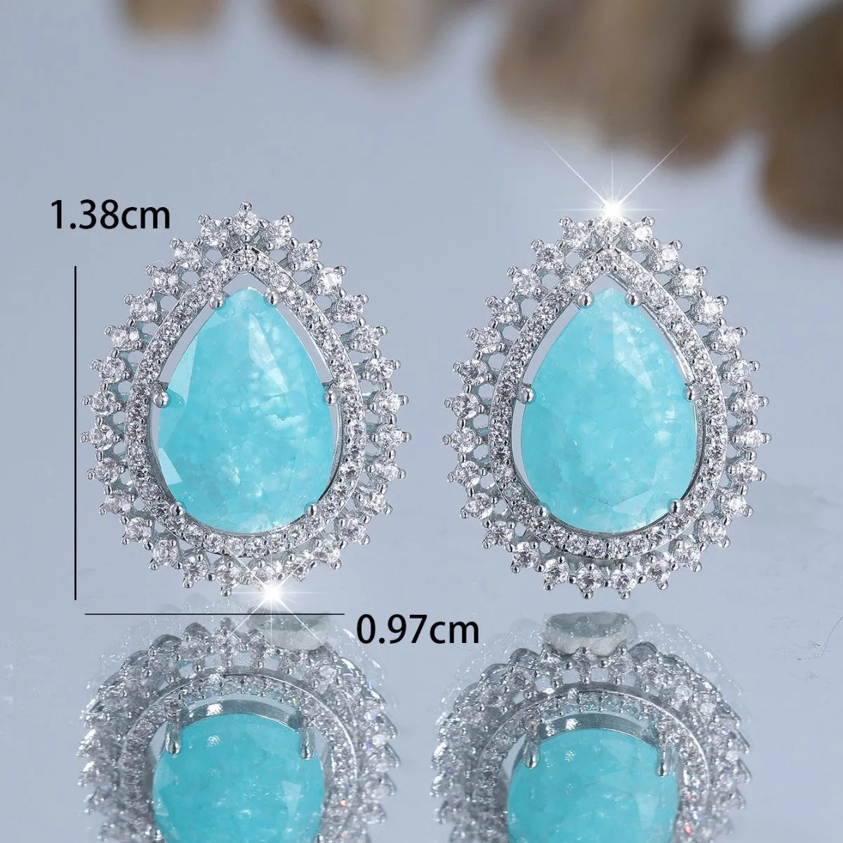 White diamond water drop ice flower earrings with heart-shaped copper design and electroplated platinum finish