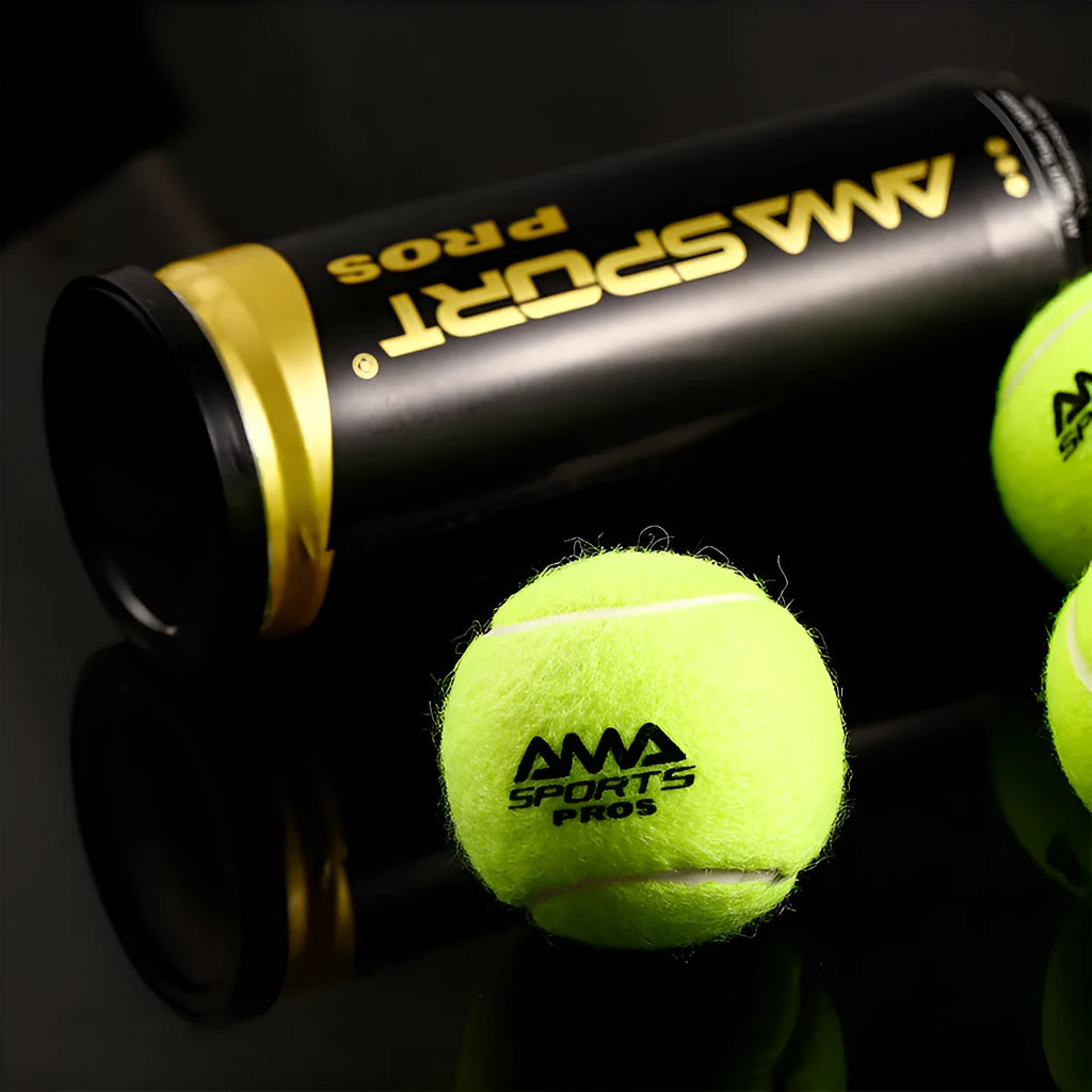 Three high elasticity tennis training balls in black, green and yellow colours for sports coaching