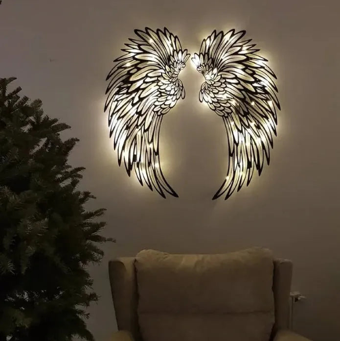 Carved metal wall decor with light, angel wings design, double-sided black iron, 35cm pair on a wall