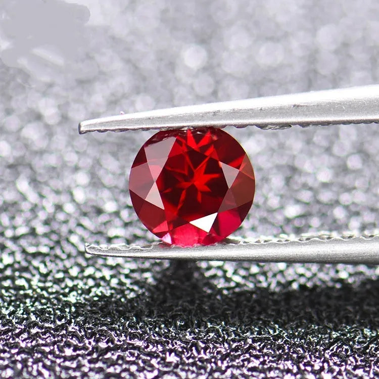 Cultured pigeon blood red ruby gemstone in multiple carat weights and cut styles