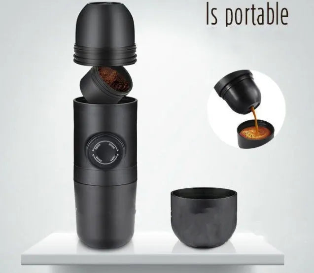 Compact black portable manual coffee machine for espresso, shown with dimensions 6cm by 17.5cm