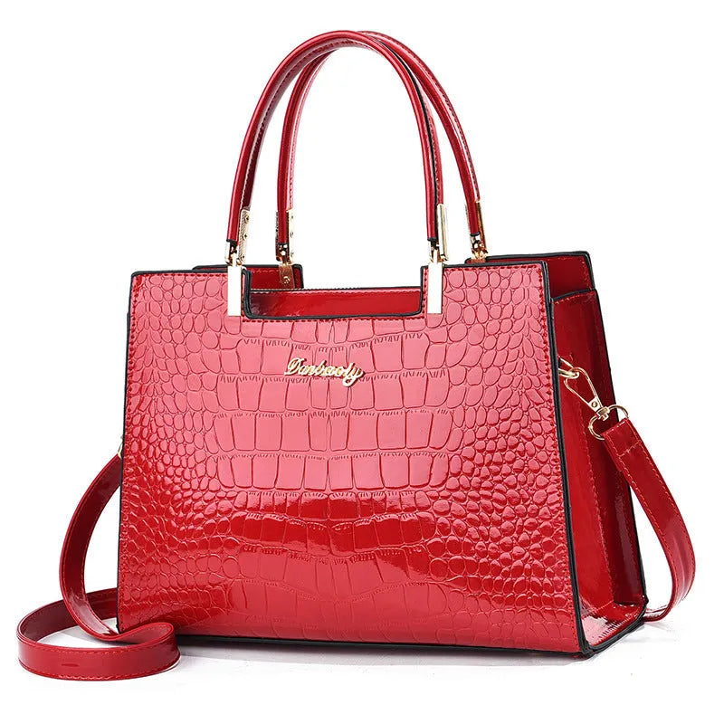 Women's one-shoulder handbag in horizontal square suitcase shape made from medium-hard PU leather