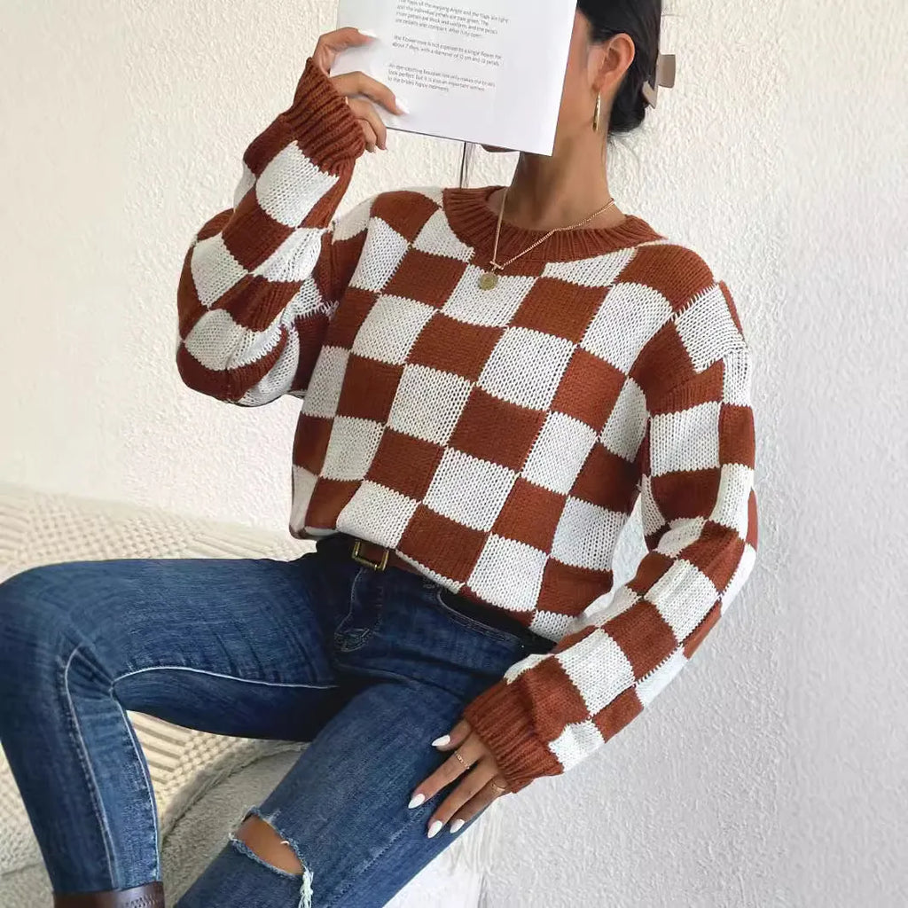 Dark brown women's plaid pullover sweater with long sleeves and a loose fit.