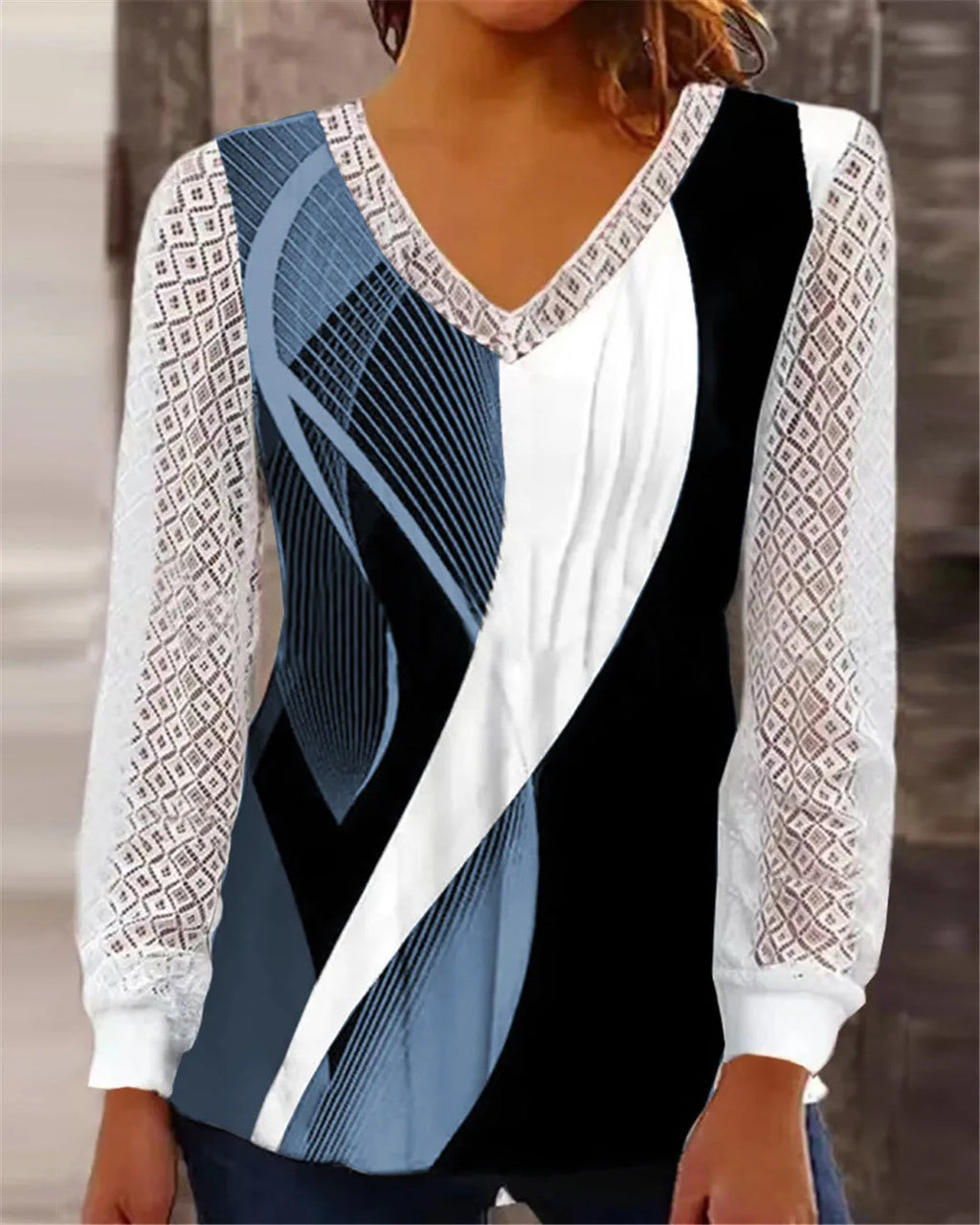 Women's v-neck loose top with hollow-out lace print in purple colour showing front view
