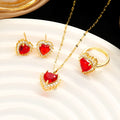Gold red titanium steel jewellery set with heart and floral pendant, including necklace, ring, and ear studs.
